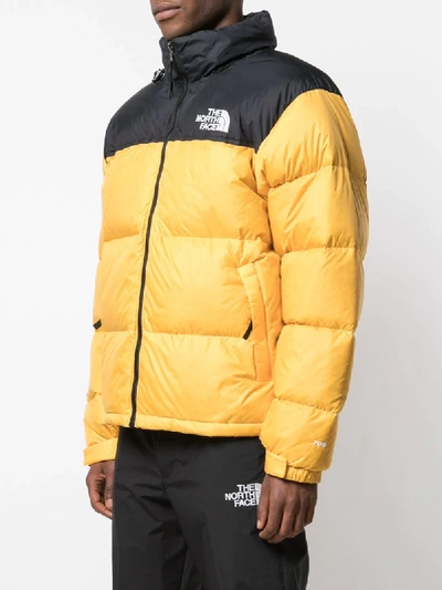 Shop The North Face 1996 Retro Nuptse Jacket In Yellow