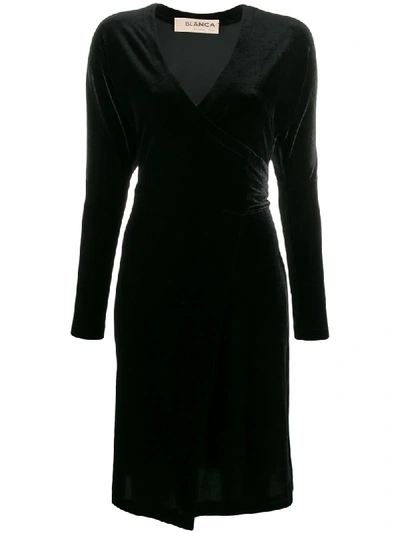 Shop Blanca Short Velvet Wrap Dress In Black