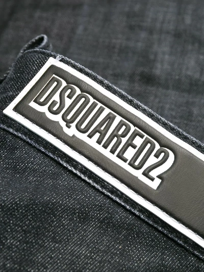 Shop Dsquared2 Distressed Effect Jeans In Black