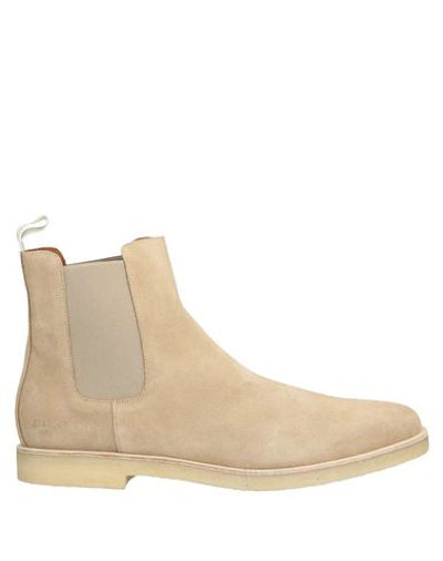 Shop Common Projects Boots In Beige