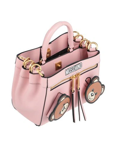 Shop Moschino Handbag In Light Pink