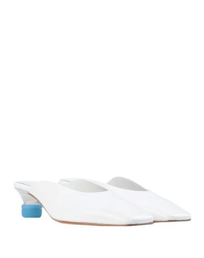 Shop Miista Mules & Clogs In White