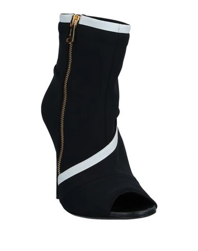 Shop Vionnet Ankle Boots In Black
