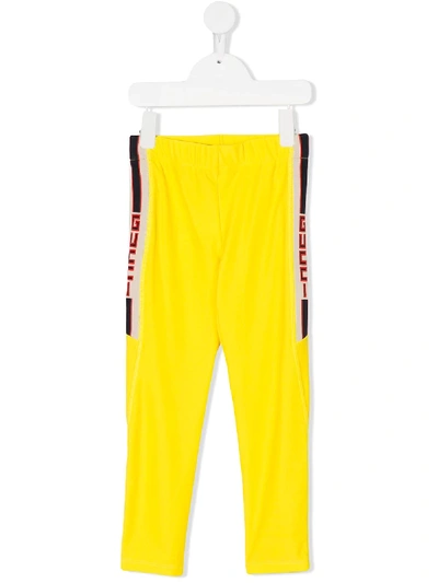Shop Gucci Branded Side Stripe Leggings In Yellow