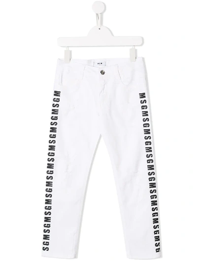 Shop Msgm Logo Print Distressed Jeans In White