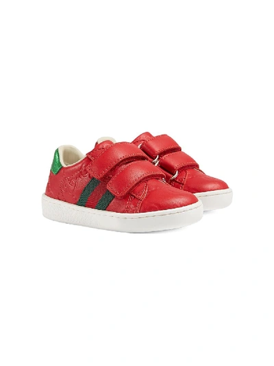 Shop Gucci Gg Embossed Sneakers In Red