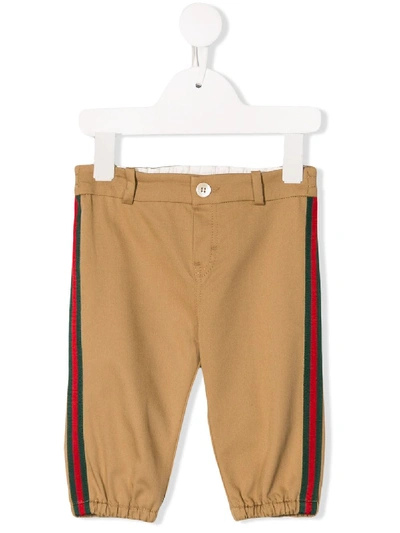 Shop Gucci Side Tape Chinos In Neutrals