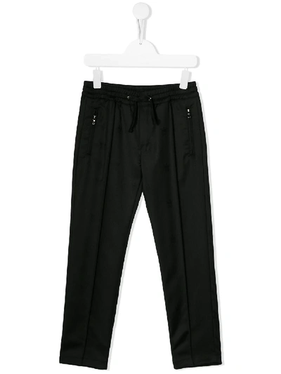 Shop Dolce & Gabbana Elasticated Waist Trousers In Black