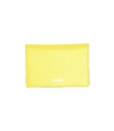 Shop Ganni Textured Leather Clutch In Lemon In Yellow