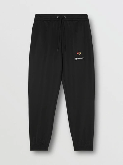 Shop Burberry Logo Graphic Jersey Trackpants In Black