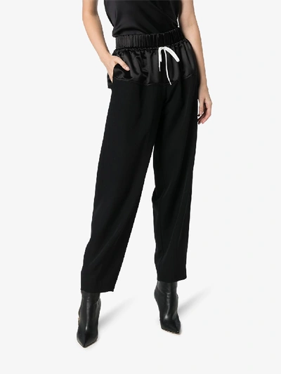 Shop Givenchy Wide Leg Silk Track Pants In Black