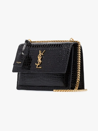 Shop Saint Laurent 'sunset' Schultertasche Im Kroko-look In Black