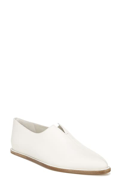 white slip on loafers