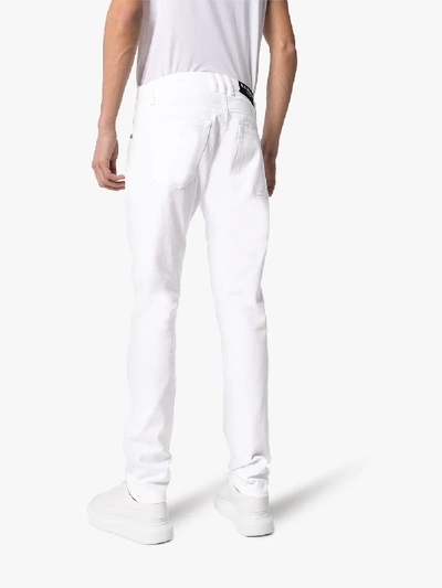 Shop Balmain Slim Fit Jeans In White