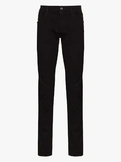Shop Dolce & Gabbana Logo Plaque Slim Jeans In Black