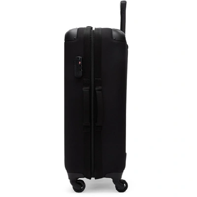 Shop Eastpak Black Medium Tranzshell Suitcase