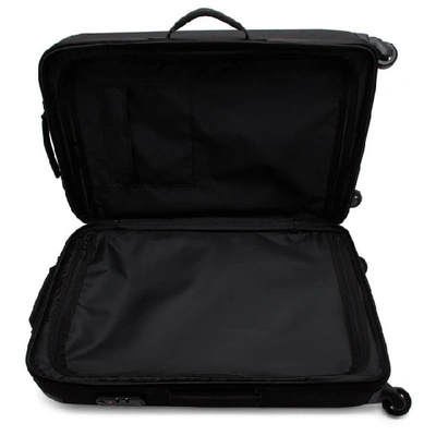 Shop Eastpak Black Medium Tranzshell Suitcase