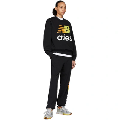 Shop Aries Black New Balance Edition Logo Lounge Pants