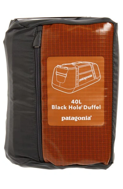 Shop Patagonia Black Hole Water Repellent 40-liter Duffle Bag In Hammonds Gold