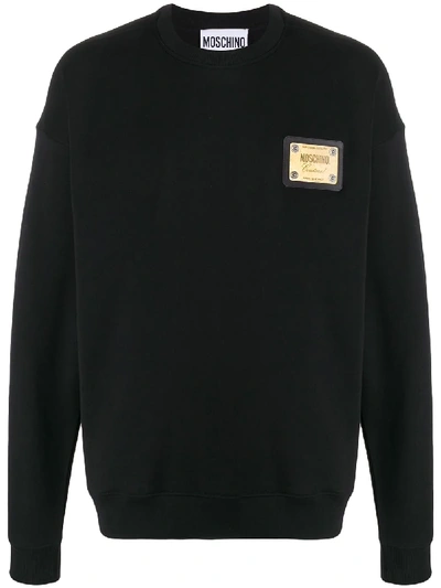 Shop Moschino Metal Plaque Logo Sweatshirt In Black