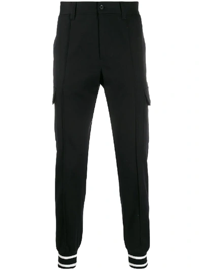 Shop Dolce & Gabbana Striped Ankle Trousers In Black