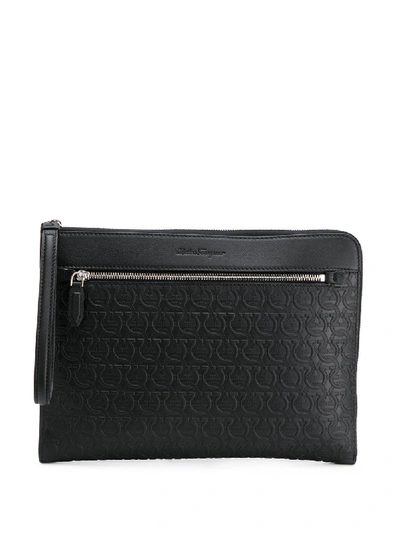 Shop Ferragamo Monogram-pattern Clutch Bag In Black