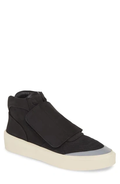 Shop Fear Of God Mid Skate Sneaker In Black With Silver
