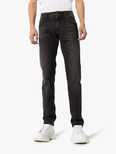 Shop Dolce & Gabbana Black Faded Logo Plaque Jeans