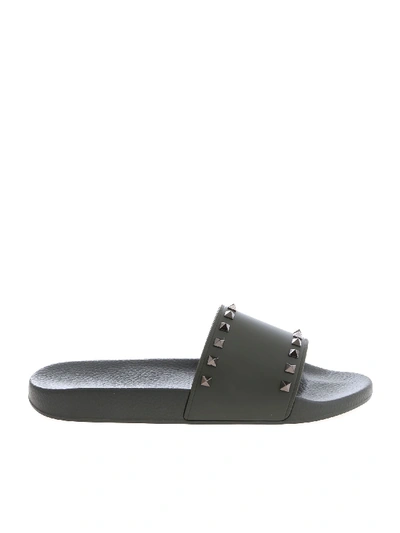 Shop Valentino Rockstud Rubber Slides In Olive Green