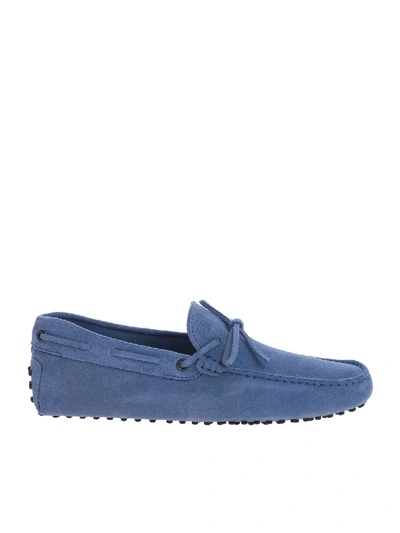 Shop Tod's Light Blue Suede Gommino Loafers