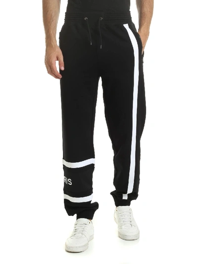 Shop Givenchy Black Trousers With Logo Embroidery