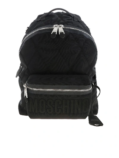 Shop Moschino Black Quilted Backpack With Logo