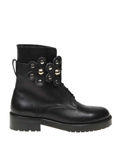 Shop Red Valentino Black Leather Boots With Flower Puzzle Detail