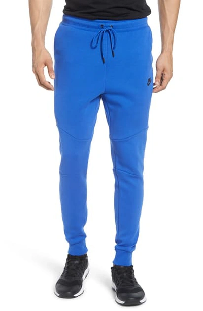 Shop Nike Tech Fleece Jogger Pants In Game Royal/ Black