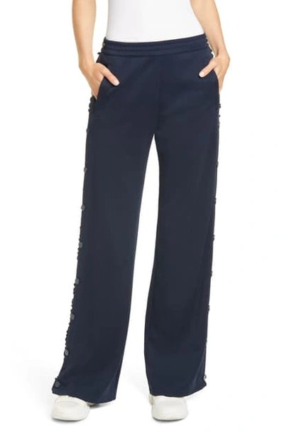 Shop Tory Sport Ruffle Tear Away Track Pants In Tory Navy