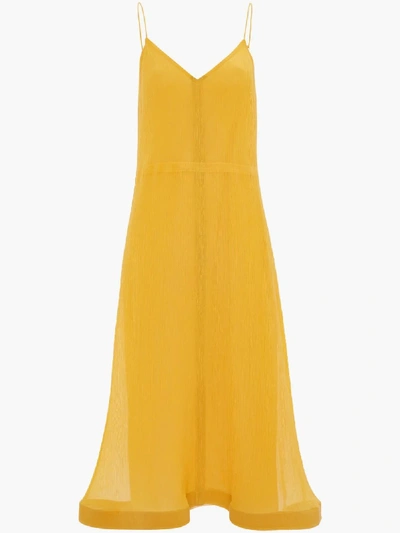 Shop Jw Anderson Trumpet Hem Pleat Dress In Yellow