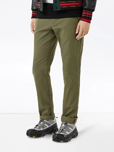 Shop Burberry Icon Stripe Cuff Chinos In Green