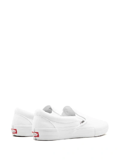 Shop Vans Slip-on Pro Sneakers In White