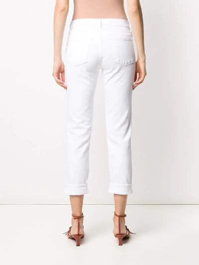 Shop J Brand Jhonny Mid-rise Jeans In White
