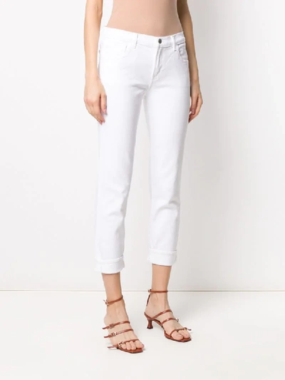 Shop J Brand Jhonny Mid-rise Jeans In White