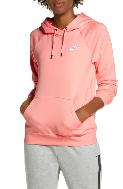 Shop Nike Sportswear Essential Pullover Fleece Hoodie In Bleached Coral/ White