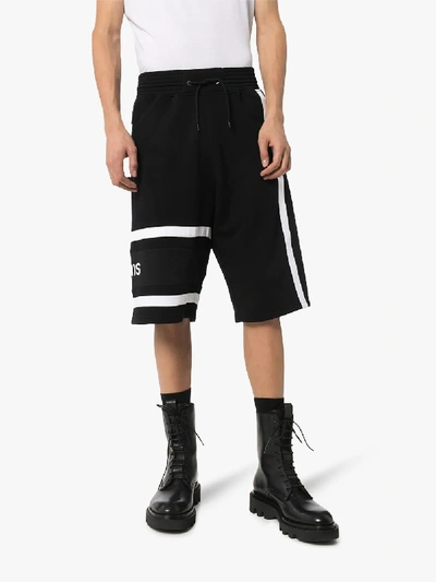 Shop Givenchy Embroidered Logo Shorts In Black