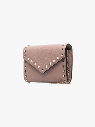 Shop Valentino Beige Rockstud Leather Clutch Bag In Neutrals