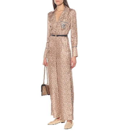 Shop Fendi Printed Silk-twill Jumpsuit In Beige