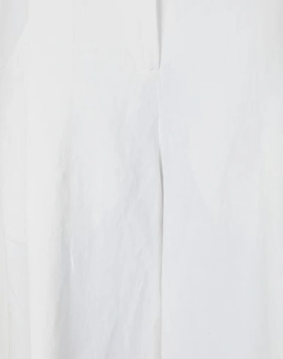 Shop Jacquemus Casual Pants In White