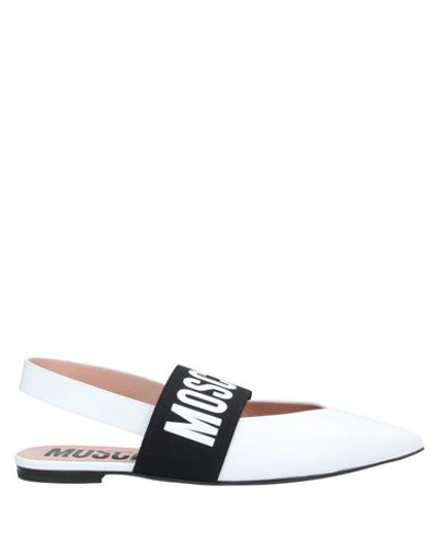 Shop Moschino Ballet Flats In White