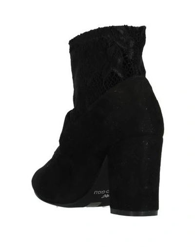 Shop Romeo Gigli Ankle Boots In Black