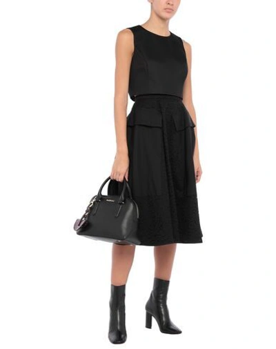 Shop Baldinini Cross-body Bags In Black