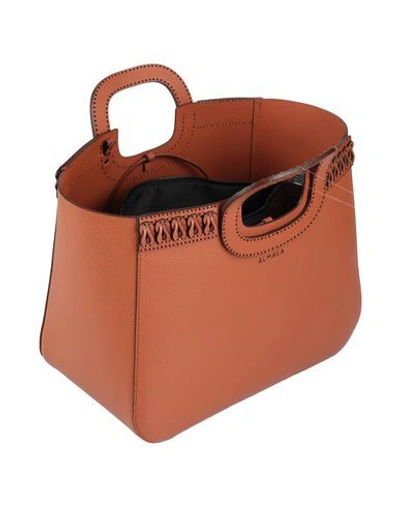 Shop Almala Handbag In Brown