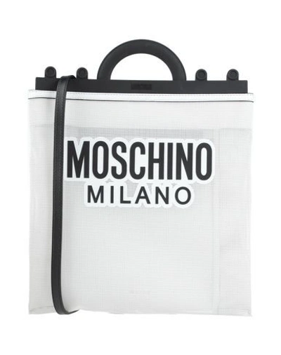 Shop Moschino Handbags In White